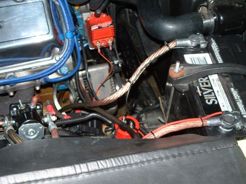 1978 Ford Ranchero - The engine bay shows a battery, starter solenoid, and various electrical connections.