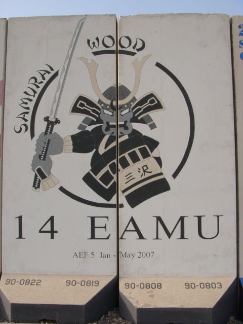 1978 Ford Bronco - Artwork on concrete barriers depicts a samurai warrior and unit markings, dated Jan-May 2007.