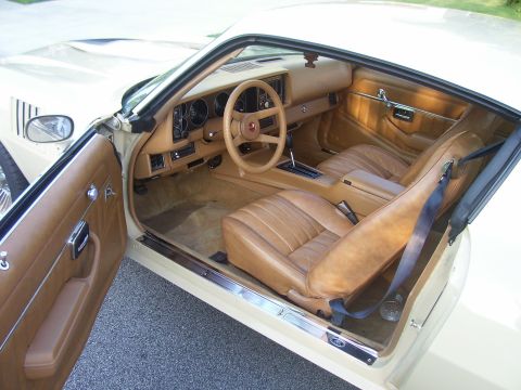 1979 Chevrolet Camaro - Interior view of a 1979 Chevrolet Camaro, its tan upholstery and dashboard details.