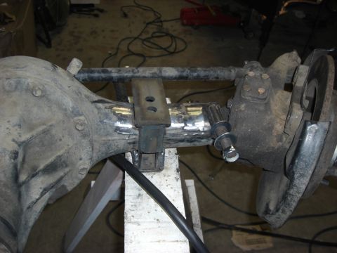 1987 Suzuki Samurai - Close-up view of a modified rear axle assembly, likely for off-road use.