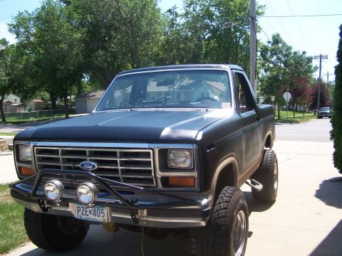 1986 Ford Bronco - This 1986 Ford Bronco is modified with a custom front bumper and lifted suspension.