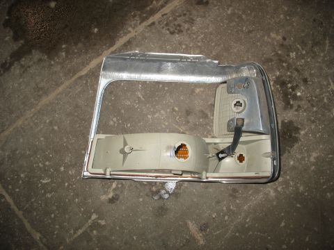 1995 Ford C-350 (Centurion Conversions) - This is a tail light assembly, likely from a truck or van, with its internal components visible.