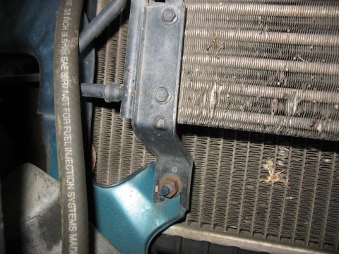 1995 Ford C-350 (Centurion Conversions) - Detail of intercooler and a fuel injection hose, indicating the part is not for fuel injection systems.