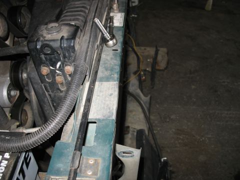 1995 Ford C-350 (Centurion Conversions) - Close-up view of engine bay components, showing the radiator and associated parts.