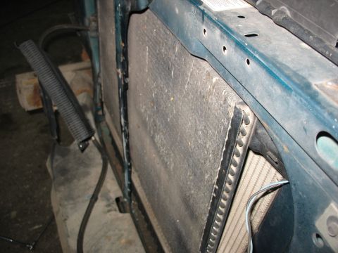 1995 Ford C-350 (Centurion Conversions) - The intercooler is mounted in front of the radiator. A black ribbed hose is visible to the left.