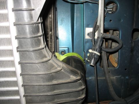 1995 Ford C-350 (Centurion Conversions) - Engine bay components, including intercooler piping and electrical connectors, are visible in this close-up shot.