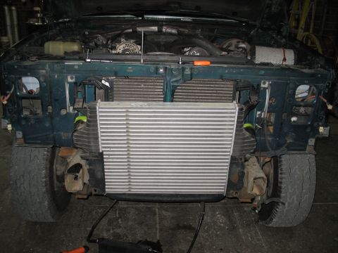 1995 Ford C-350 (Centurion Conversions) - Front view of a 1995 Ford C-350 (Centurion Conversions) with its front fascia removed for intercooler installation.