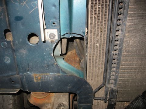 1995 Ford C-350 (Centurion Conversions) - Detail view of the intercooler and radiator components, showing modifications to the vehicle's frame.