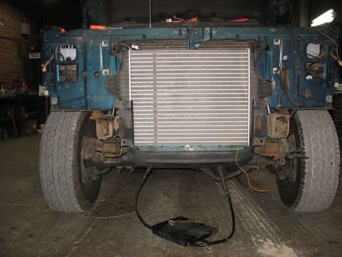 1995 Ford C-350 (Centurion Conversions) - Front end of a 1995 Ford C-350 (Centurion Conversions) during an intercooler installation.