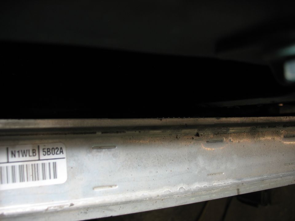 Metal bracket with label N1WLB 5B02A and barcode