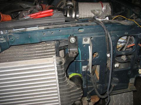 1995 Ford C-350 (Centurion Conversions) - Close-up view of intercooler and intake plumbing during installation, showing the components and mounting hardware.