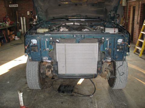1995 Ford C-350 (Centurion Conversions) - Front view of a 1995 Ford C-350 (Centurion Conversions) during an intercooler installation.