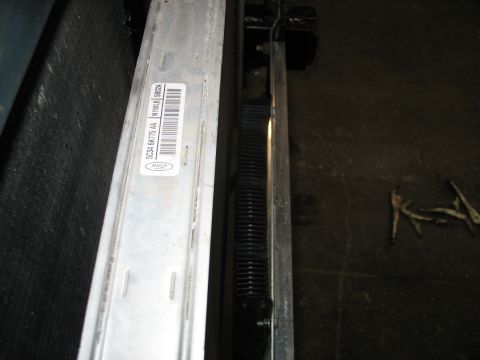 1995 Ford C-350 (Centurion Conversions) - Close-up of a Ford intercooler part, showing the part number and barcode.