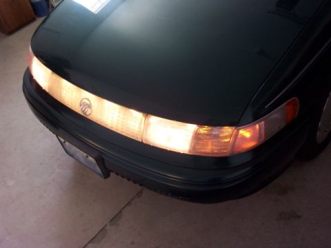 1995 Mercury Sable - The front lightbar with the headlights on. This is one of my favorite features of this car. Notice how clean the car is. I just washed it b…