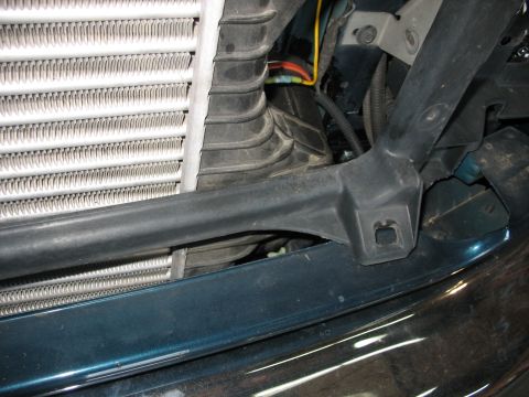 1995 Ford C-350 (Centurion Conversions) - Intercooler and radiator assembly with visible wiring and mounting hardware.
