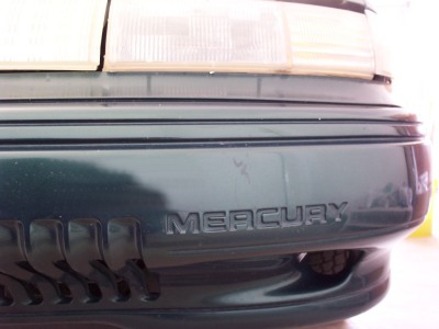 1995 Mercury Sable - Mercury cut-out on bumper
