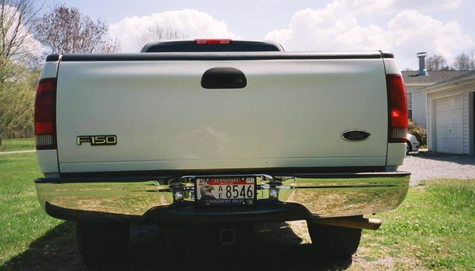 Rear of white Ford F-150 pickup truck, Tennessee license plate A 8546