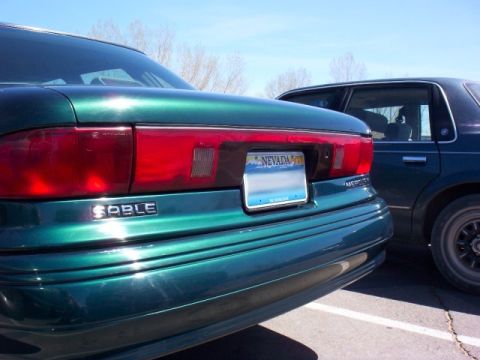 1995 Mercury Sable - An artistic picture (with cool sun glare) of the rear end.