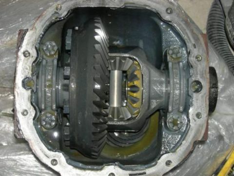 2007 Ford Mustang - The internal components of a vehicle's differential are exposed, showing the gears and housing.