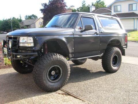 1996 Ford Bronco - This lifted 1996 Ford Bronco features aggressive off-road tires and a custom bumper.