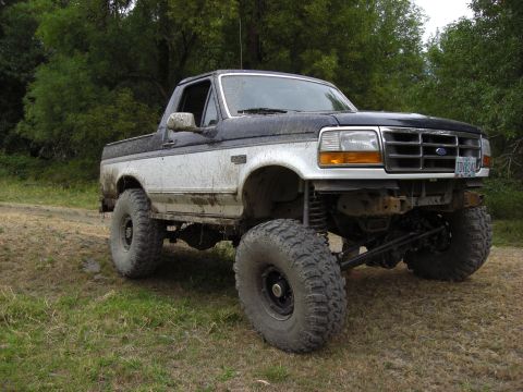1993 Ford Bronco - This modified 1993 Ford Bronco sits high off the ground with its large off-road tires.