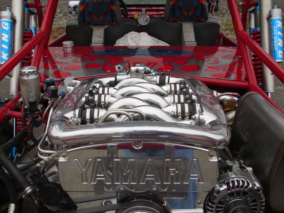 Custom dune buggy with a Yamaha engine, chrome intake manifold, and King Off-Road shocks