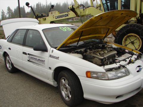 1992 Ford Taurus - 1992 Ford Taurus at an event, possibly a track day, with its engine exposed.