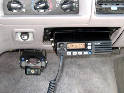 1996 Ford Bronco - Interior view of a vehicle's dashboard, showing an installed radio and trailer brake controller.
