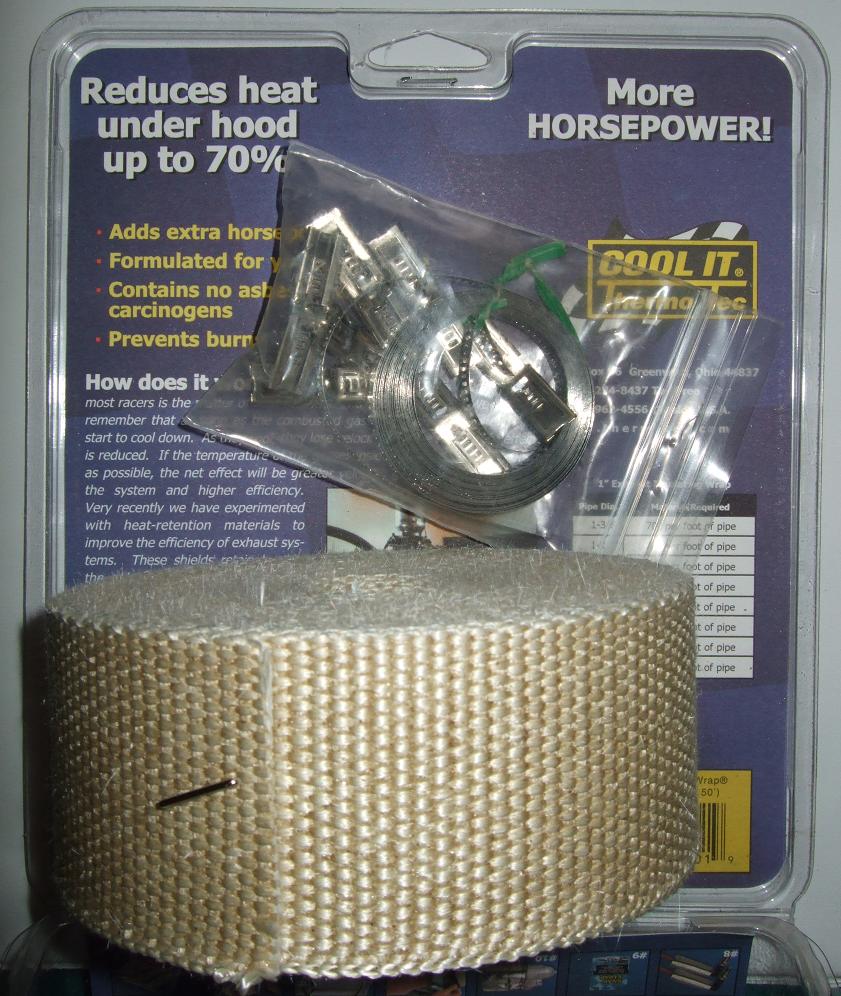 Exhaust wrap kit with clamps and instructions. Packaging states 'Reduces heat under hood up to 70%' and 'More HORSEPOWER!'