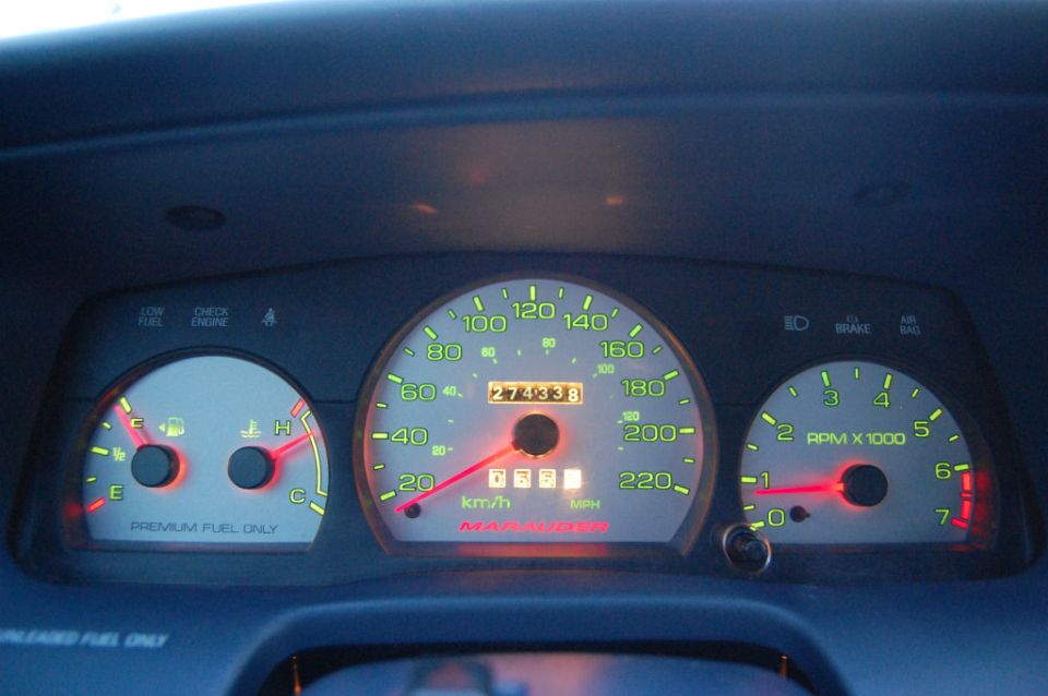 Dashboard gauges with "Marauder" text, odometer showing 274338 miles