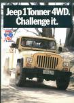1991 Ford Bronco - Jeep 1 Tonner 4WD advertised with the slogan 'Challenge it.'