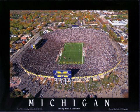 1996 Ford Bronco - Michigan Stadium, 'The Big House', in Ann Arbor, filled with fans during a game.