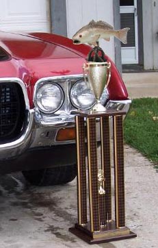 1971 Ford Ranchero - 1971 Ford Ranchero front corner with a trophy beside it.