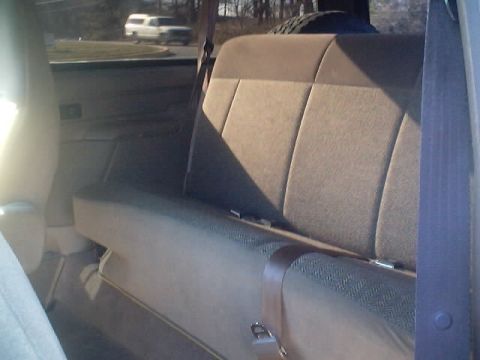 1992 Ford Bronco - The interior of a 1992 Ford Bronco shows the rear seat and seatbelts.