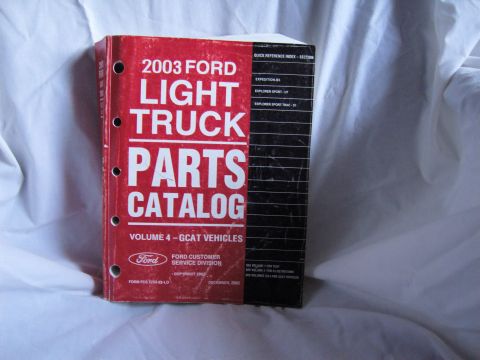2007 Ford Mustang - Photograph of the red 2003 Ford Light Truck Parts Catalog Volume 4 cover with a quick-reference section index.