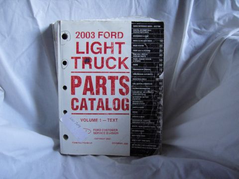 2007 Ford Mustang - Photograph of the 2003 Ford Light Truck Parts Catalog Volume 1 Text cover with quick-reference section index.