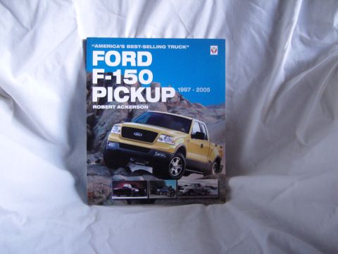 2007 Ford Mustang - Photo of the book cover 'Ford F-150 Pickup 1997-2005' by Robert Ackerson showing a yellow F-150.
