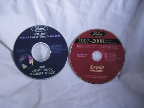 2007 Ford Mustang - Product photo of two Ford service-information DVD discs on a sheet, not a technical document.