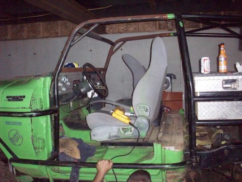 1978 Ford Bronco - This heavily modified vehicle features a roll cage, racing seats, and a custom dashboard with gauges.