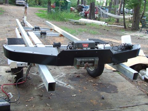 1979 Ford F-250 - Custom winch bumper assembly mounted on a trailer frame, a WARN winch.