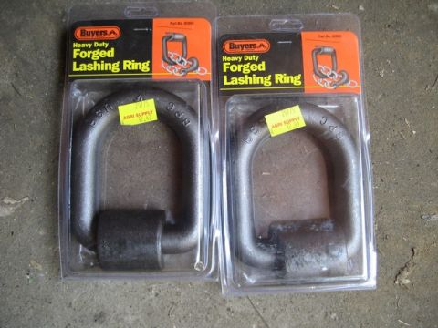 1995 Ford Bronco - Two heavy duty forged lashing rings from Buyers brand are displayed in their original packaging.