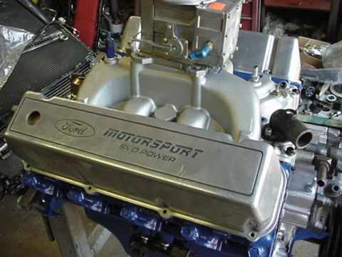 1979 Ford Bronco - A Ford Motorsport valve cover with SVO Power branding is installed on an engine assembly.