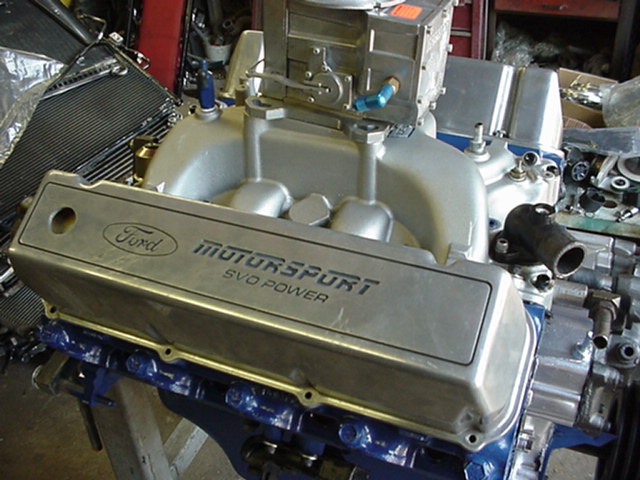 Close-up of a Ford Motorsport SVO Power valve cover on an engine block
