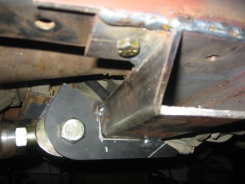 1995 Ford Bronco - Custom metalwork and suspension components are visible on the underside of a vehicle.