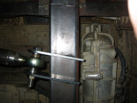 1995 Ford Bronco - Close-up view of a custom suspension component and transfer case, likely from an off-road vehicle.