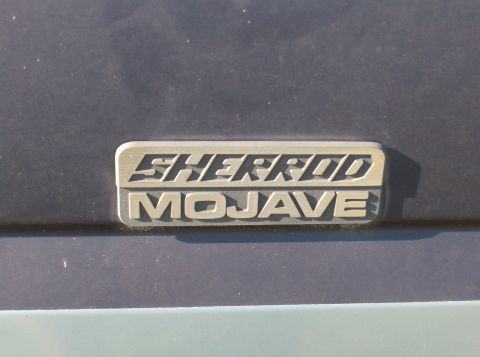 1989 Ford Bronco - Close-up of a Sherrod Mojave badge, indicating a specific trim or model, on a two-tone vehicle.