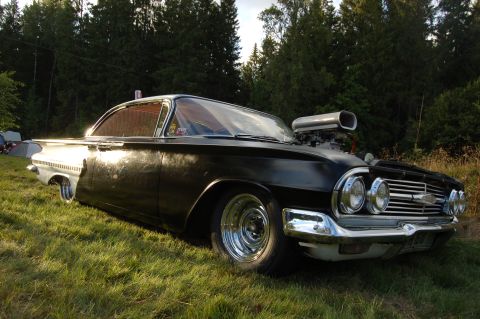 1978 Ford Bronco - Modified 1959 Chevrolet Impala with a prominent blower scoop sits on a grassy field.