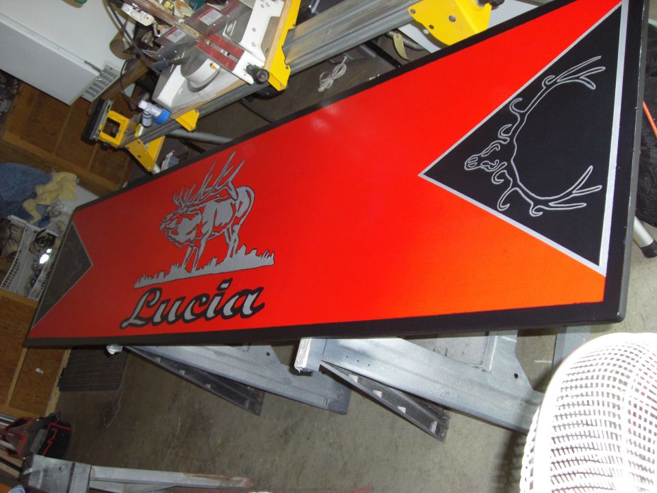 Custom sign with elk graphic and "Lucia" text