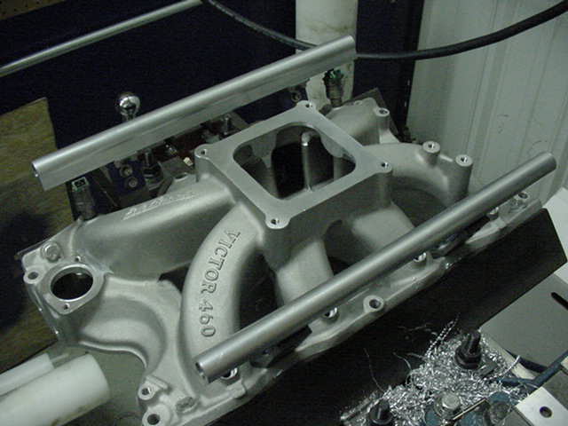 Silver intake manifold with 'VICTOR 460' text and fuel rails