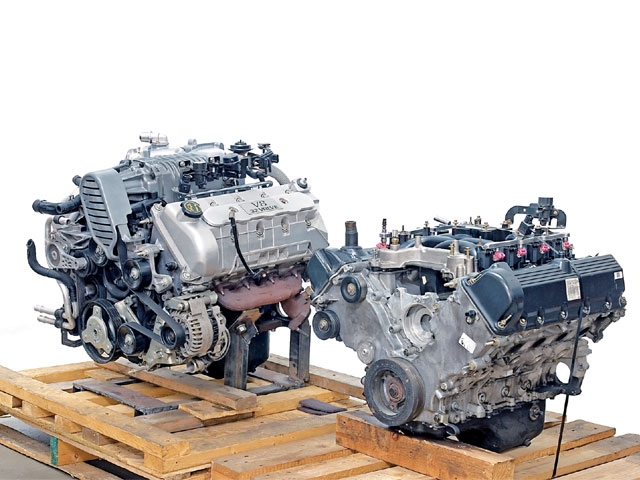 Photo of two engine assemblies on wooden pallets